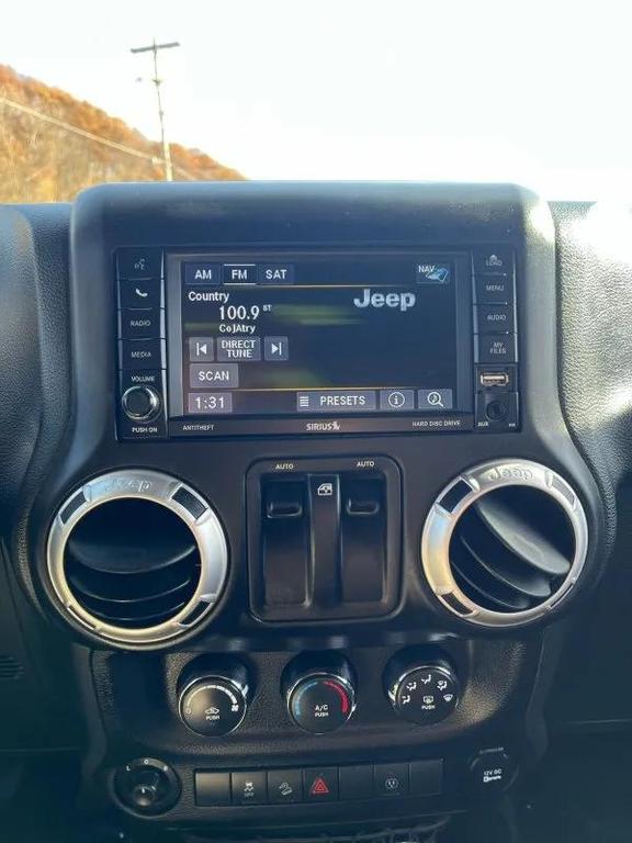 used 2015 Jeep Wrangler car, priced at $12,995