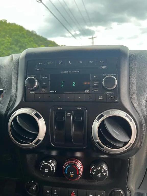 used 2015 Jeep Wrangler car, priced at $13,995