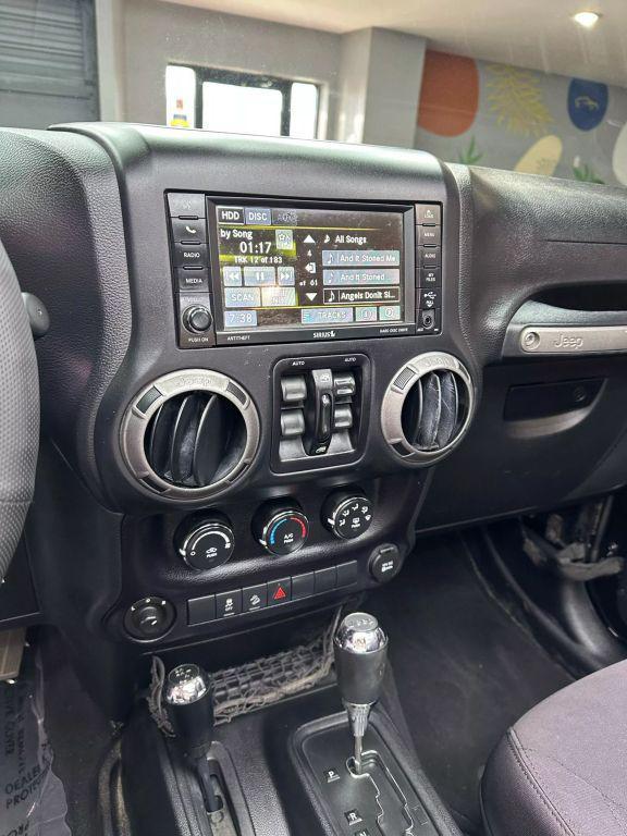 used 2016 Jeep Wrangler Unlimited car, priced at $14,999
