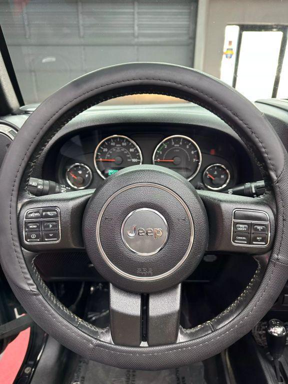 used 2016 Jeep Wrangler Unlimited car, priced at $14,999