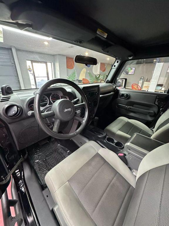 used 2010 Jeep Wrangler Unlimited car, priced at $11,999