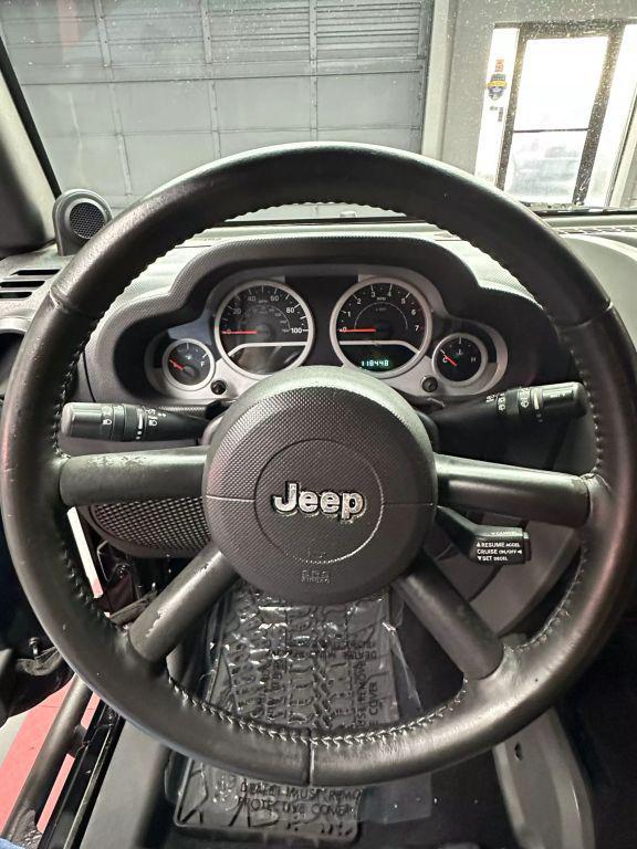 used 2010 Jeep Wrangler Unlimited car, priced at $11,999