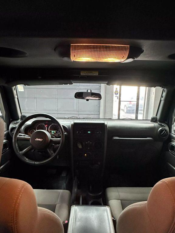 used 2010 Jeep Wrangler Unlimited car, priced at $11,999