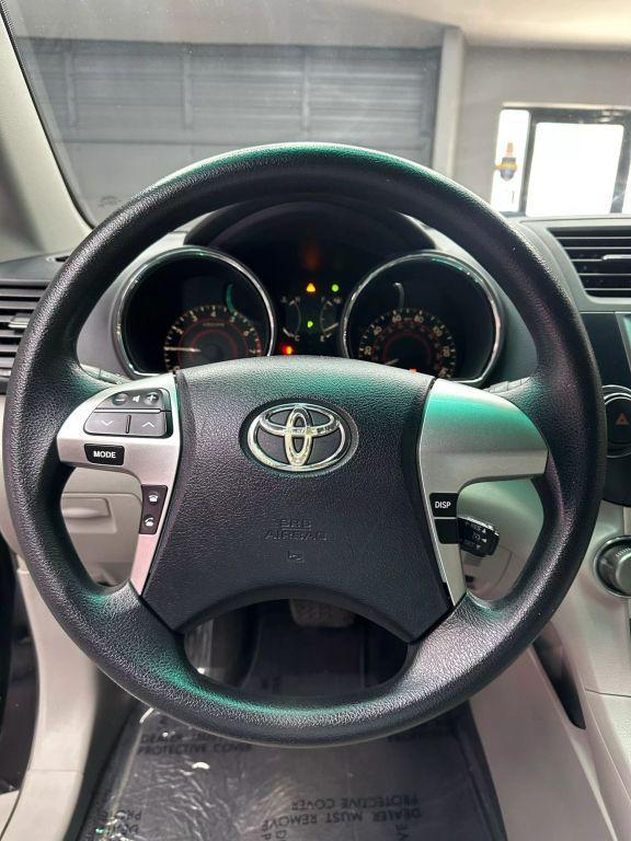 used 2013 Toyota Highlander car, priced at $9,999