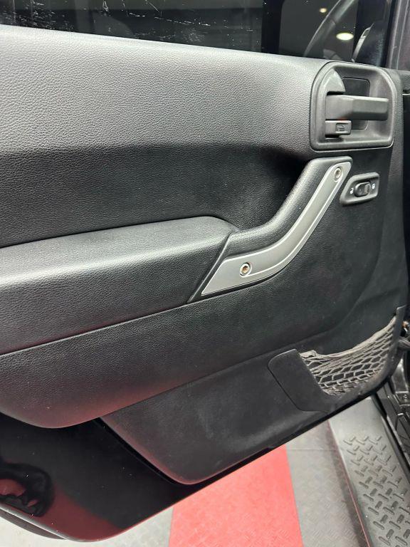 used 2012 Jeep Wrangler Unlimited car, priced at $12,999