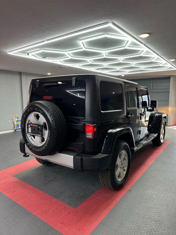 used 2012 Jeep Wrangler Unlimited car, priced at $12,999