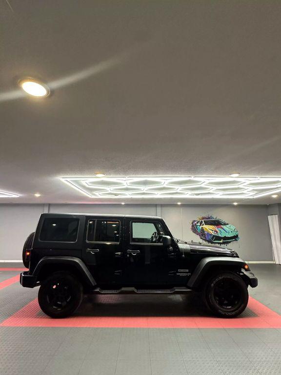 used 2012 Jeep Wrangler Unlimited car, priced at $13,999