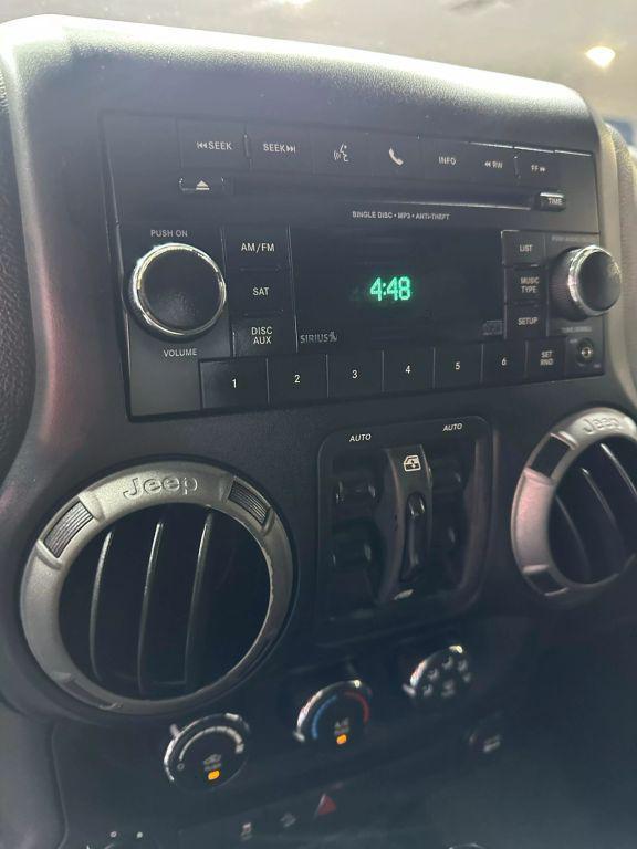 used 2012 Jeep Wrangler Unlimited car, priced at $13,999