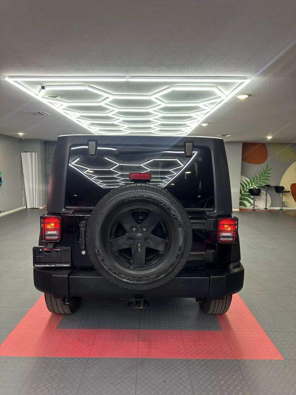 used 2012 Jeep Wrangler Unlimited car, priced at $13,999