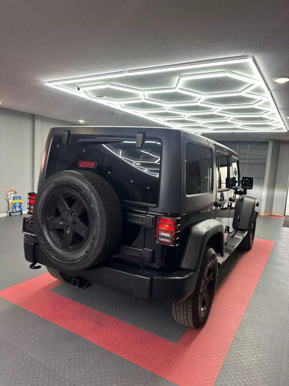 used 2012 Jeep Wrangler Unlimited car, priced at $13,999
