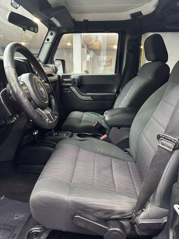 used 2012 Jeep Wrangler Unlimited car, priced at $13,999