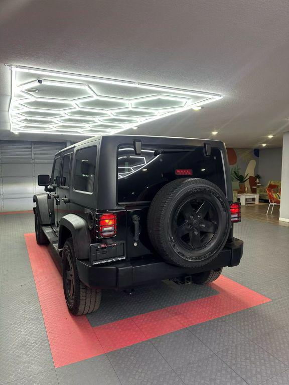 used 2012 Jeep Wrangler Unlimited car, priced at $13,999