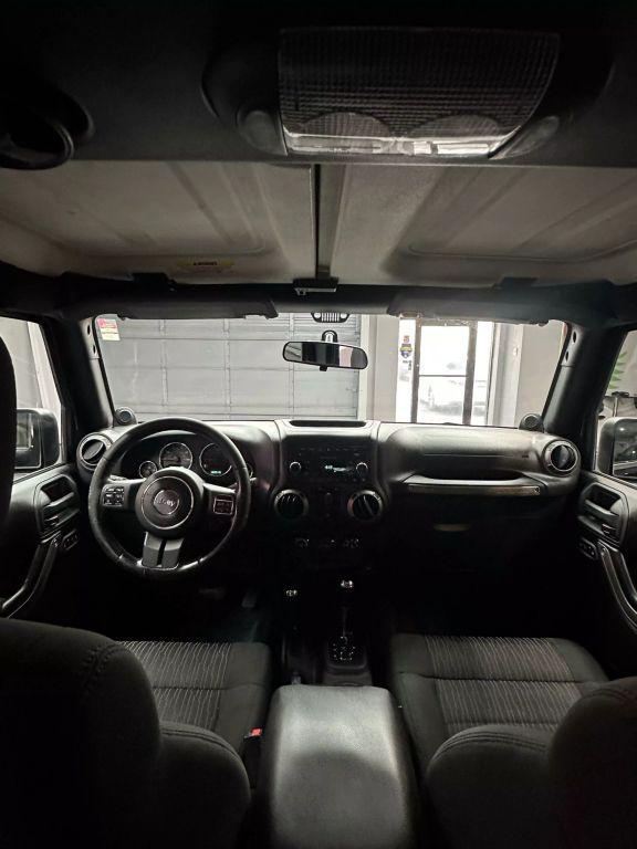 used 2012 Jeep Wrangler Unlimited car, priced at $13,999