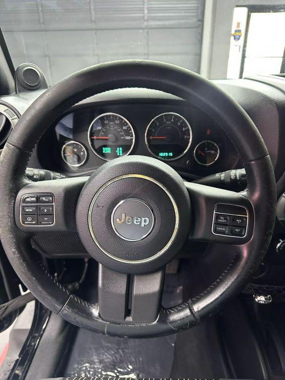 used 2012 Jeep Wrangler Unlimited car, priced at $13,999
