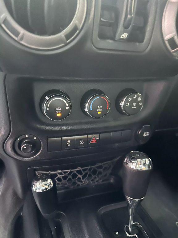used 2012 Jeep Wrangler Unlimited car, priced at $13,999