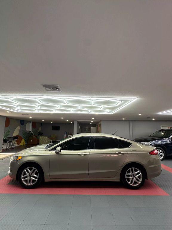 used 2016 Ford Fusion car, priced at $8,999