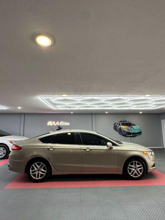 used 2016 Ford Fusion car, priced at $8,999