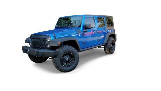 used 2016 Jeep Wrangler Unlimited car, priced at $15,994