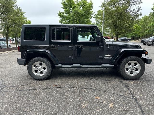 used 2014 Jeep Wrangler Unlimited car, priced at $9,900