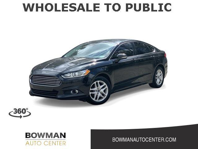 used 2014 Ford Fusion car, priced at $4,400