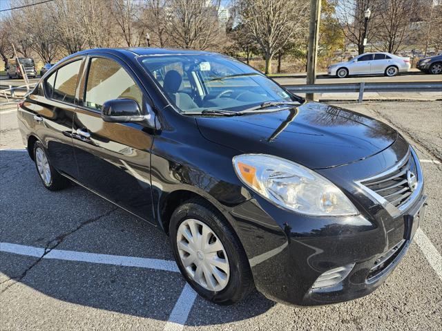 used 2014 Nissan Versa car, priced at $6,750