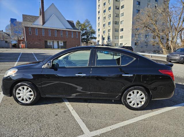 used 2014 Nissan Versa car, priced at $6,750