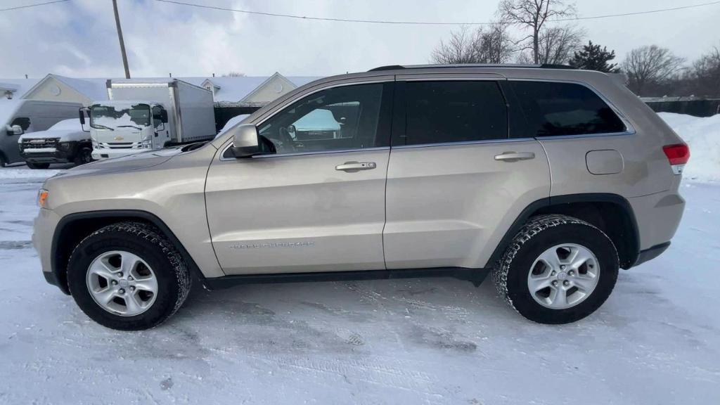 used 2014 Jeep Grand Cherokee car, priced at $10,000