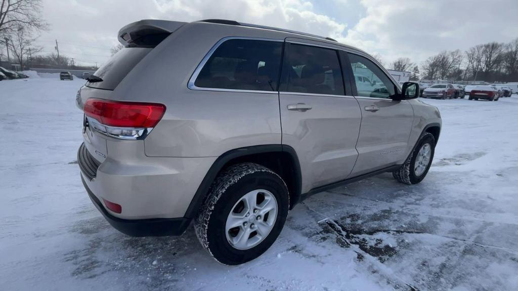 used 2014 Jeep Grand Cherokee car, priced at $10,000