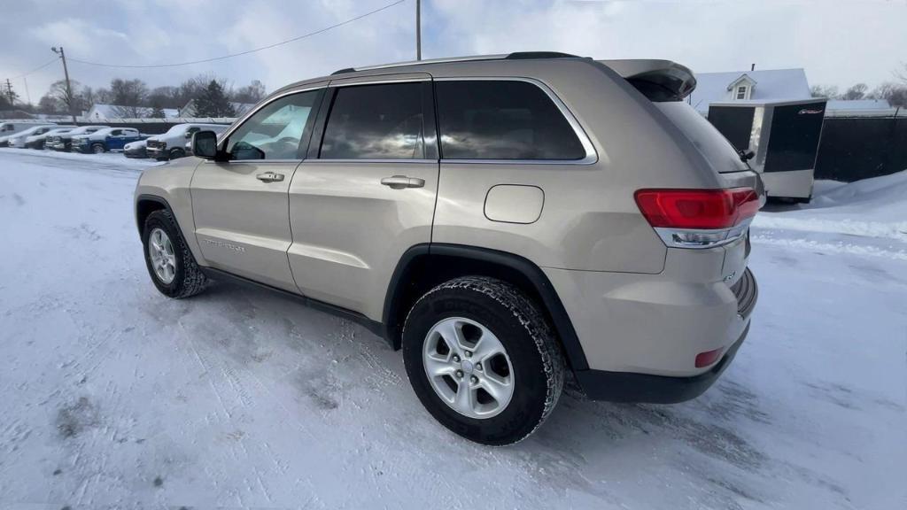 used 2014 Jeep Grand Cherokee car, priced at $10,000