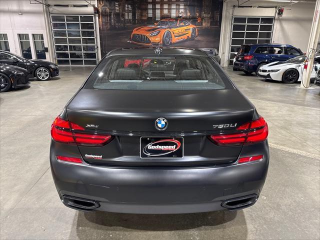 used 2018 BMW 750 car, priced at $34,495