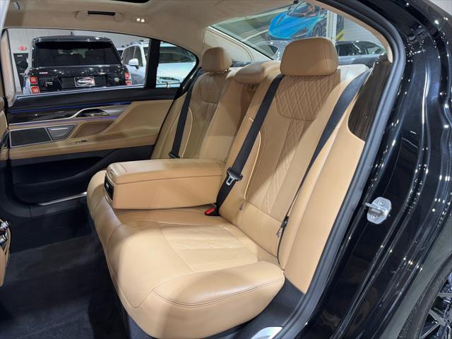 used 2016 BMW 750 car, priced at $21,495