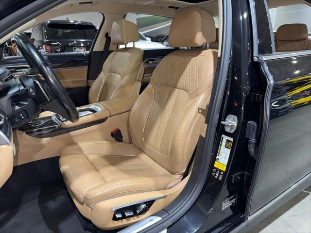 used 2016 BMW 750 car, priced at $21,495