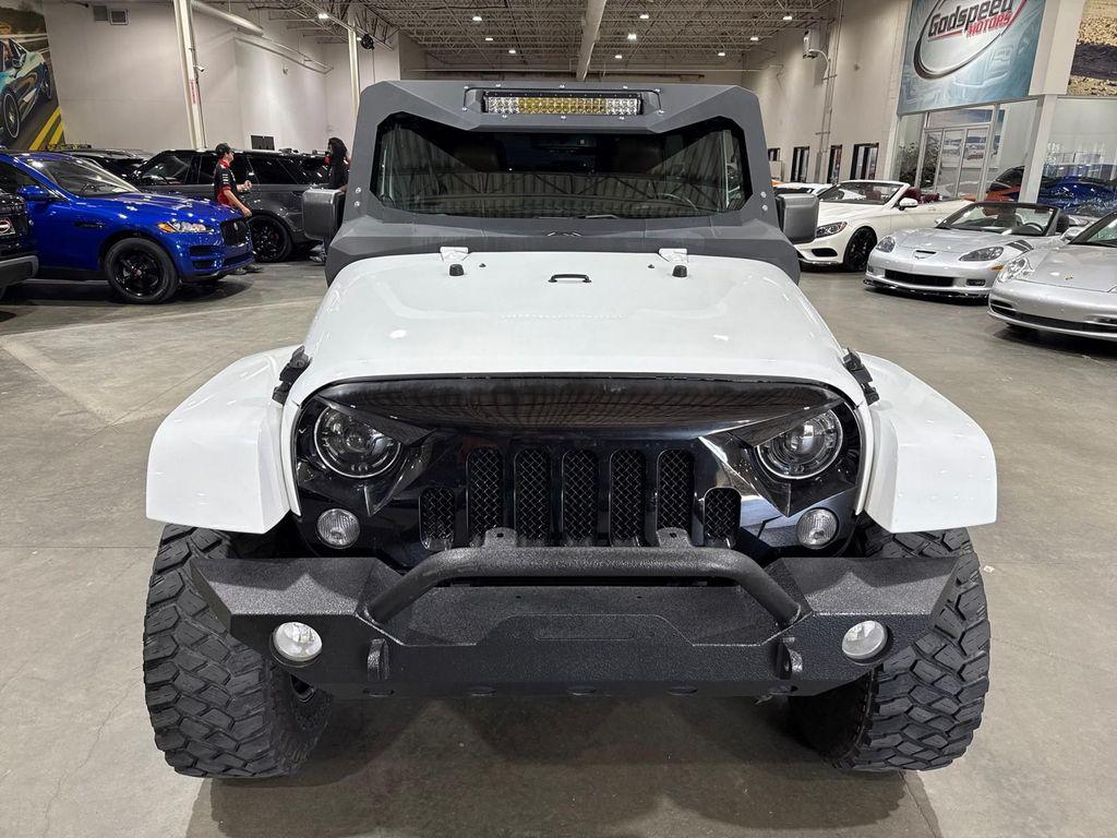 used 2014 Jeep Wrangler Unlimited car, priced at $13,995