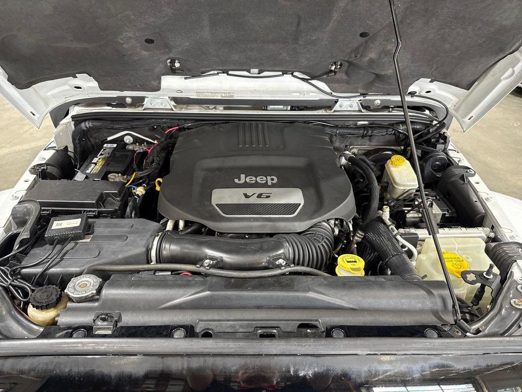 used 2014 Jeep Wrangler Unlimited car, priced at $13,995
