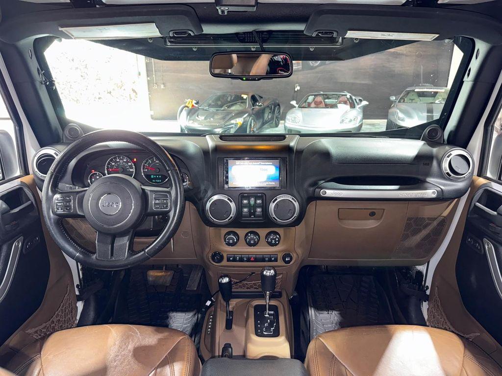 used 2014 Jeep Wrangler Unlimited car, priced at $13,995
