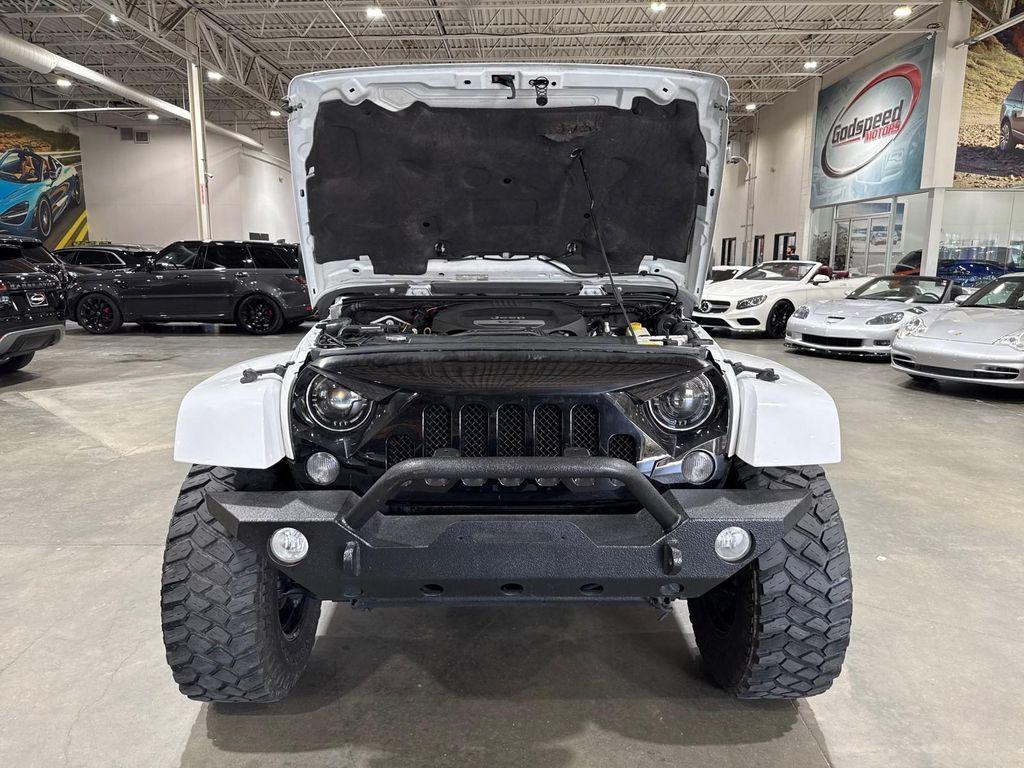 used 2014 Jeep Wrangler Unlimited car, priced at $13,995