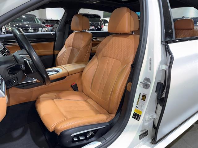 used 2016 BMW 750 car, priced at $25,995