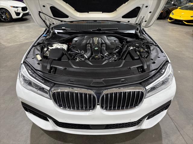 used 2016 BMW 750 car, priced at $25,995