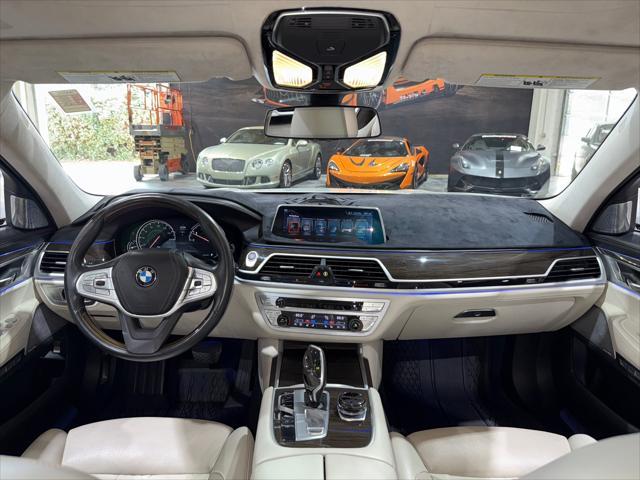 used 2016 BMW 750 car, priced at $26,995