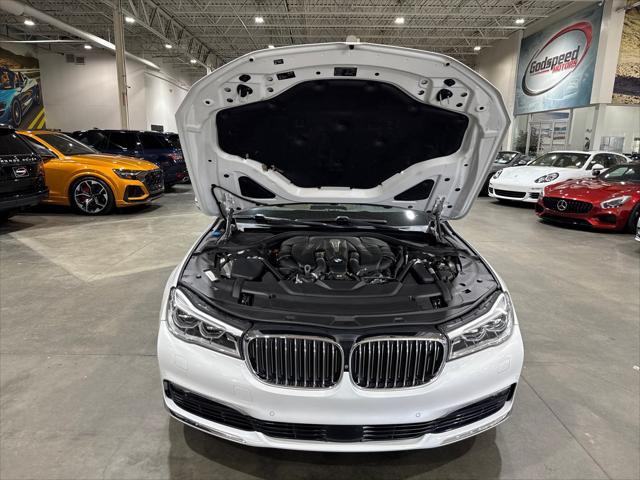 used 2016 BMW 750 car, priced at $26,995