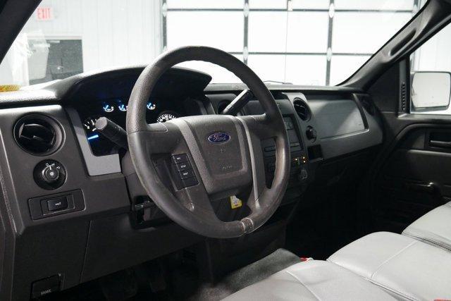 used 2014 Ford F-150 car, priced at $15,000