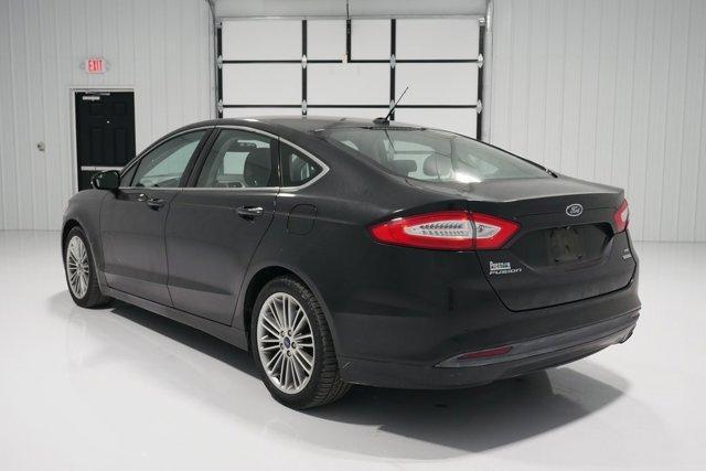used 2014 Ford Fusion car, priced at $10,000