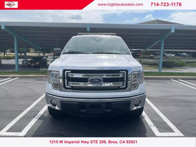 used 2014 Ford F-150 car, priced at $16,990