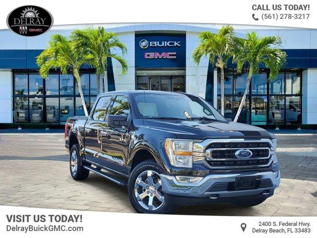 used 2021 Ford F-150 car, priced at $37,644