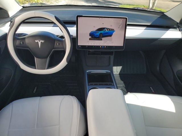 used 2023 Tesla Model 3 car, priced at $22,940