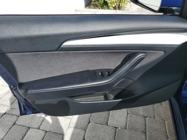 used 2023 Tesla Model 3 car, priced at $22,940