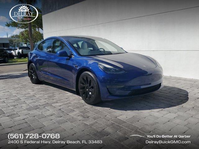 used 2023 Tesla Model 3 car, priced at $22,940
