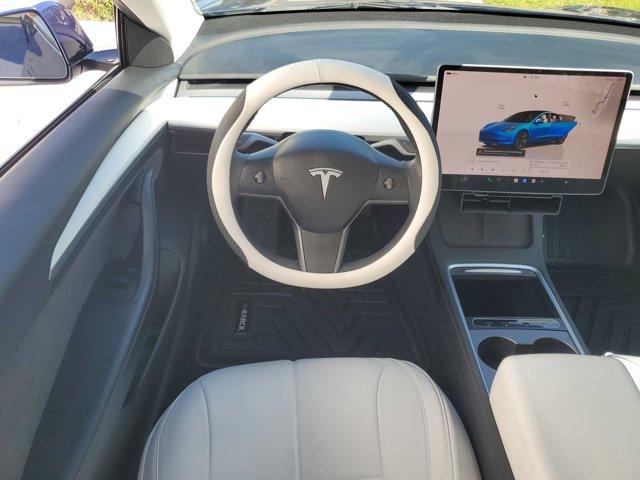 used 2023 Tesla Model 3 car, priced at $22,940