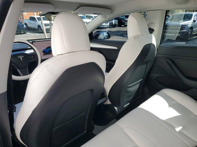 used 2023 Tesla Model 3 car, priced at $22,940