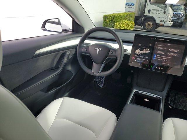 used 2023 Tesla Model 3 car, priced at $25,985